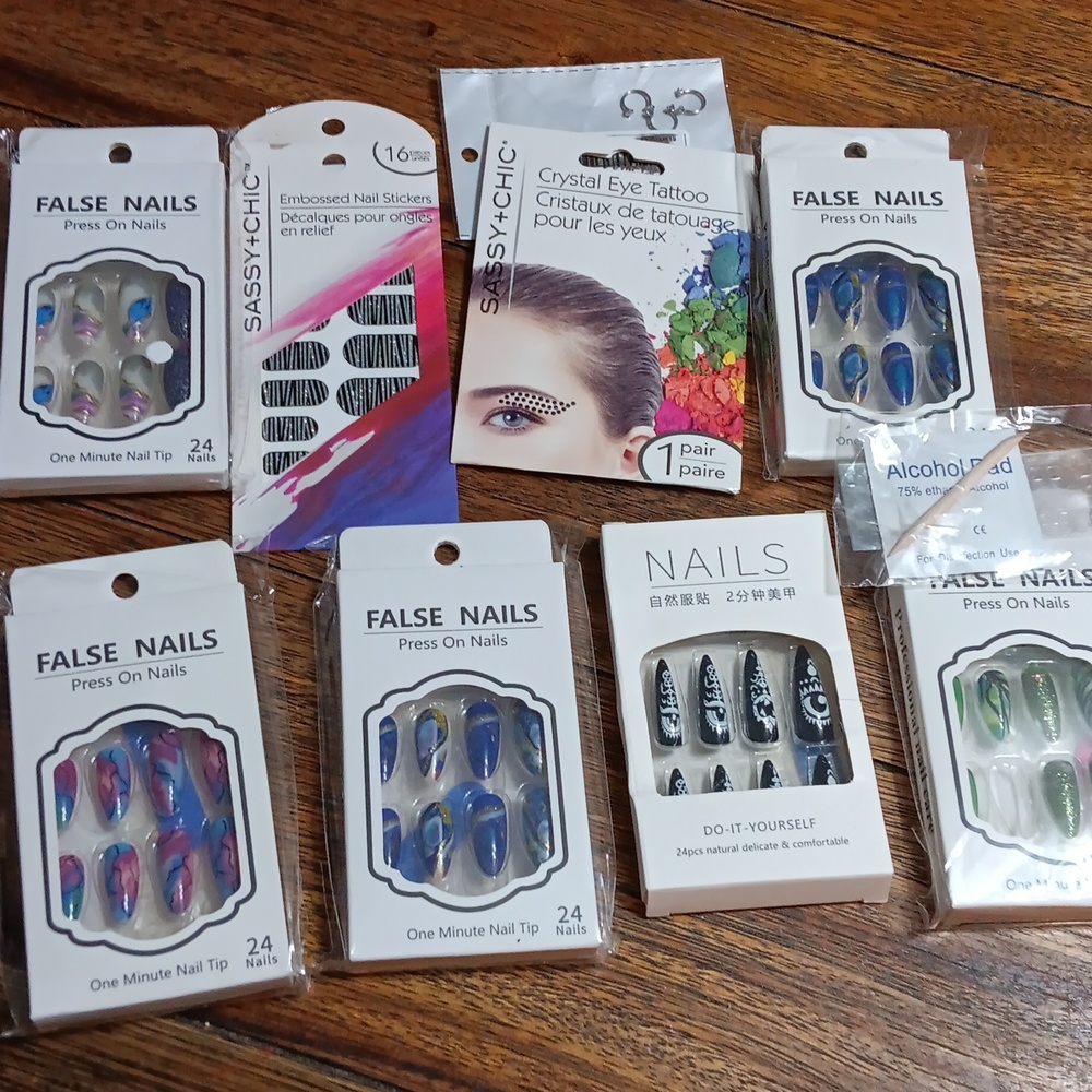 Bundle of Press on nails and nose rings